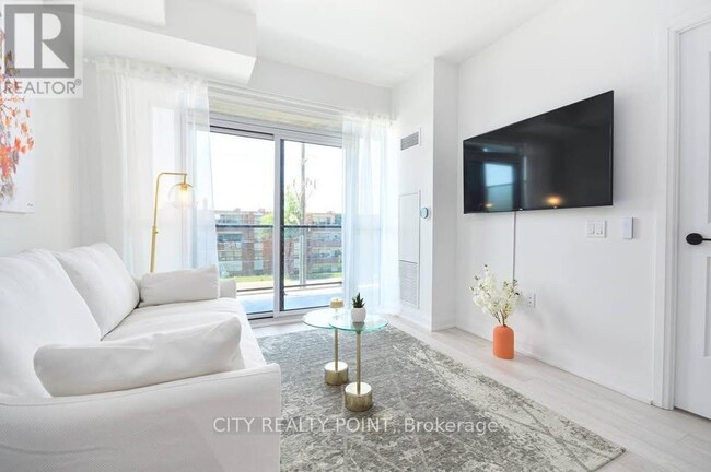 Photo - 50 George Butchart Dr Unit 211