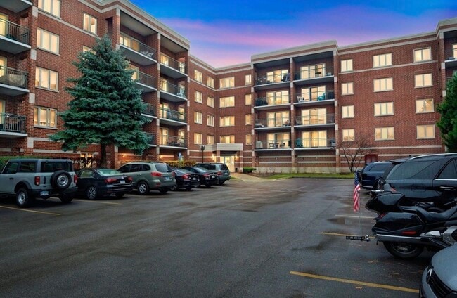 Building Photo - 6401 W Berteau Ave Unit 8-201