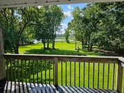View from bedroom balcony to backyard