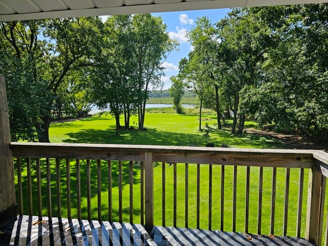 View from bedroom balcony to backyard