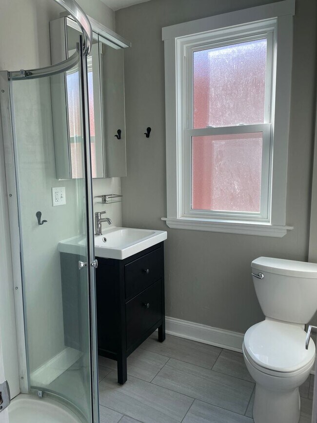 Photo - Two unit building with shared laundry and entryway