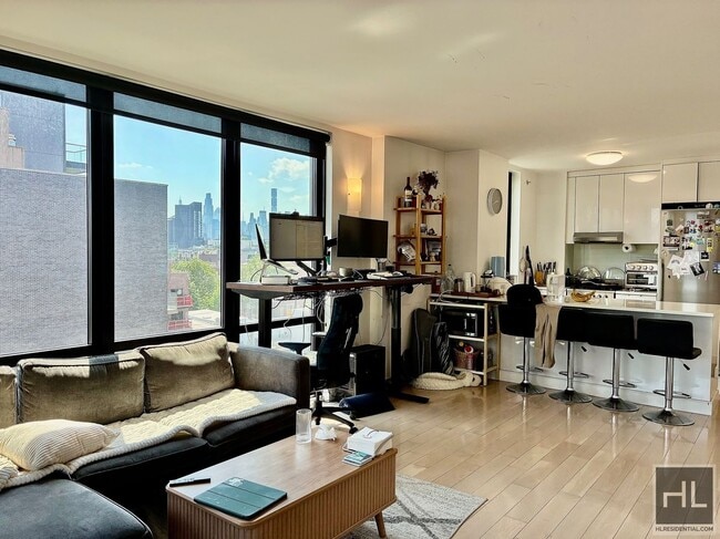 Photo - Stunning rent stabilized 1 bedroom with private balcony, onsite laundry, gym & roof deck Unit 6C