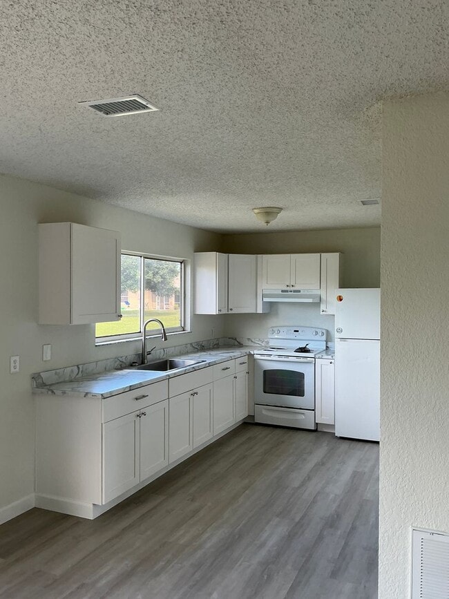 Photo - EAST  of U S hwy 1.    Interior  fully ren...