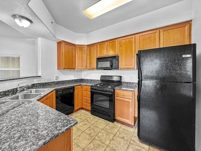 Building Photo - Updated 2BR/2BA Condo with Garage in Prime... Unit 1300 Moon Cir - 1326