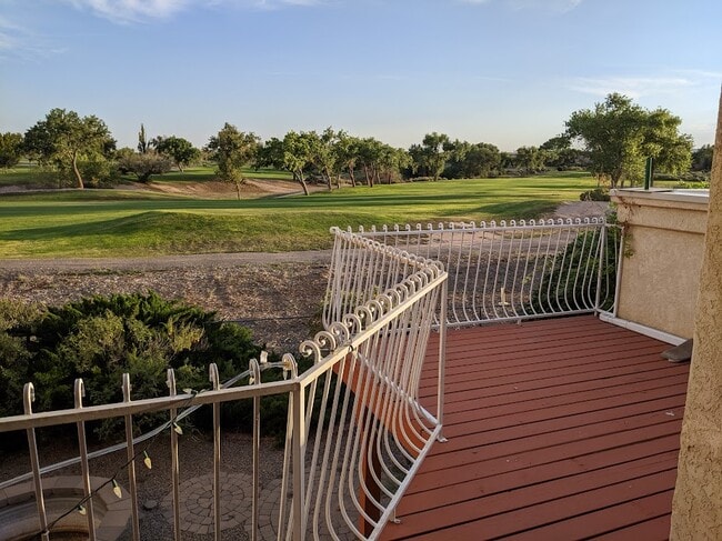 Large deck facing out to the golf course. - 6424 Saint Josephs Ave NW Townhome