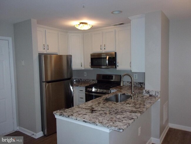 Building Photo - 11844 Breton Ct Unit 19A Rental
