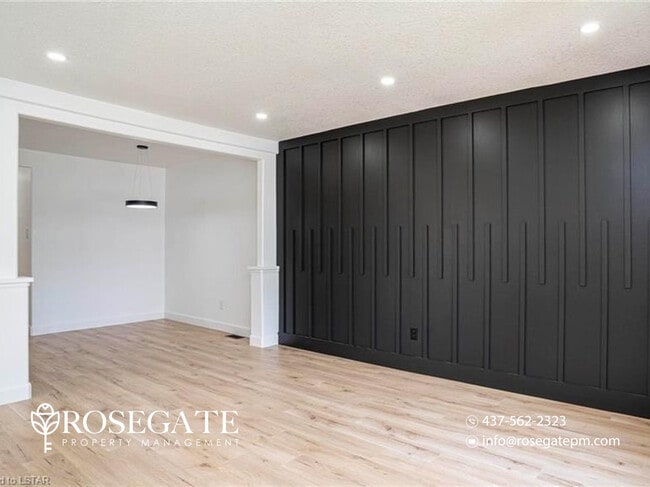 Photo - Spacious 3-Bedroom Main-Level Apartment with Front Porch & Parking in London Unit 1