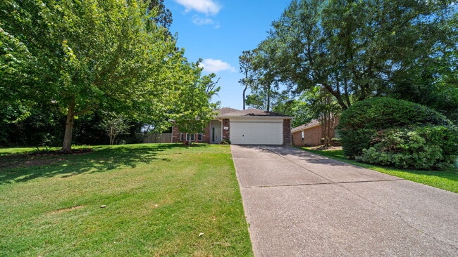 Photo - Move-In Ready Montgomery Home with Fenced Yard & Mature Trees!