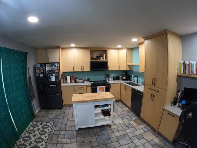 From living room looking into kitchen - 3500 Rolling Green Dr Unit B4 Rental