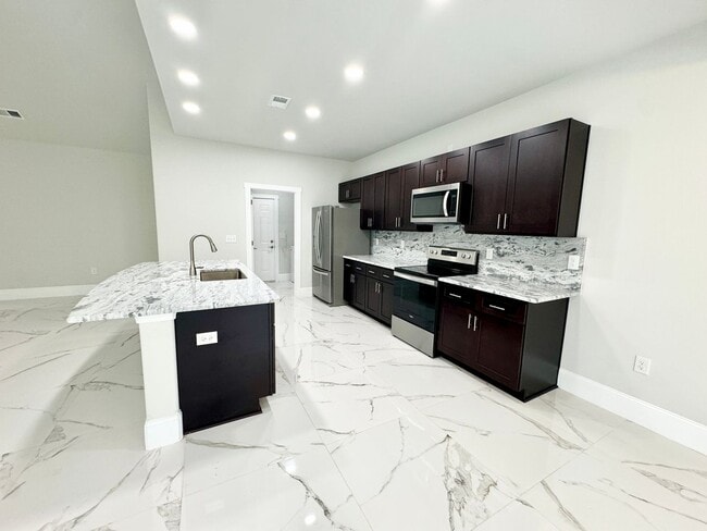 Photo - LOOK AT THIS ONE! BEAUTIFUL home with a pond view right outside the back patio!