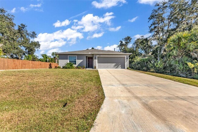 Photo - 3/2 FL dream home w/ large backyard & stylish new construction feel!!