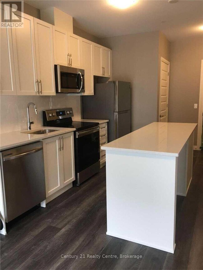 Photo - 102 Grovewood Common Unité 134