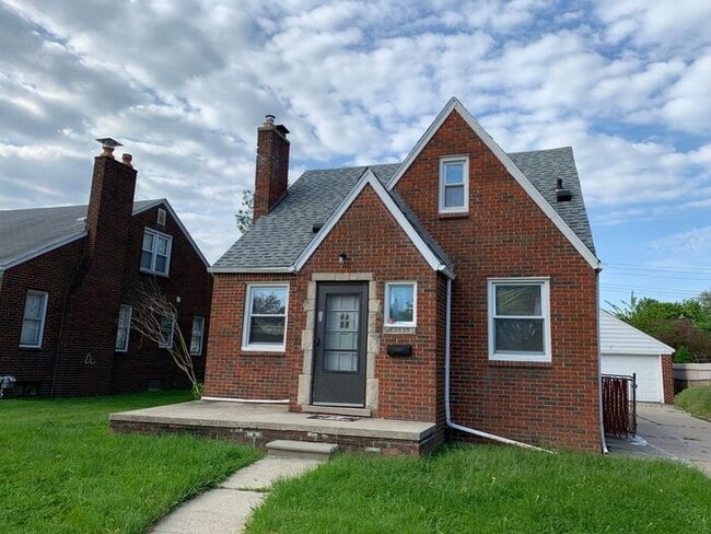 Building Photo - Charming Brick Bungalow w/ basement and detached garage