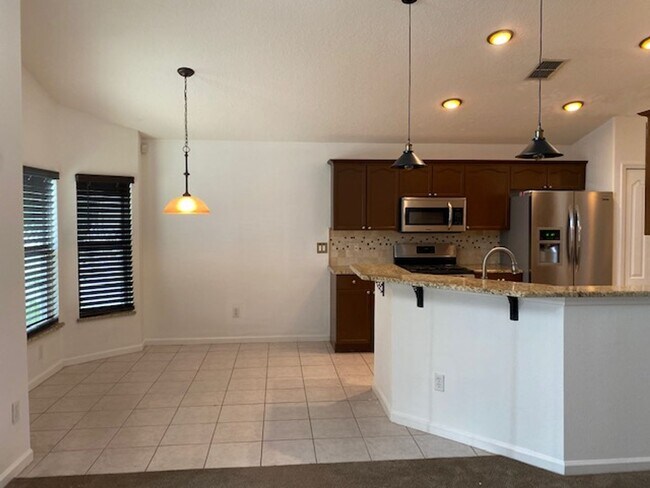 Photo - Lakefront 3-Bedroom Pool Home in Gated Com...