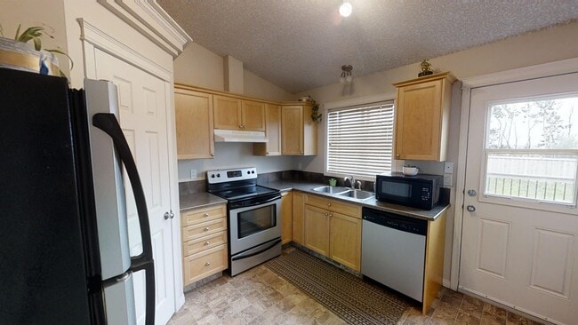 Photo - 11225-11269 69 Ave