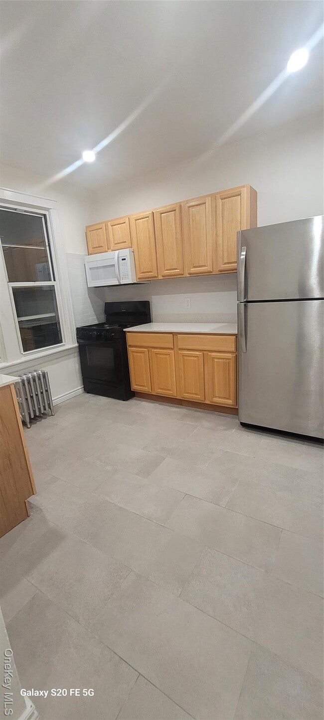 Building Photo - 238-05 Braddock Ave Unit 2