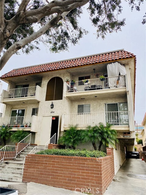 Building Photo - 1254 W 8th St Unit 1
