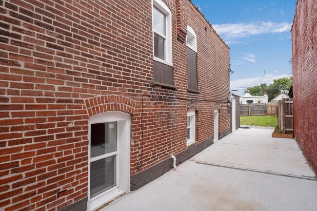 Photo - $1795 - Single Family Home with Private Two-Level Living Spaces, Driveway Parking & Modern Updates