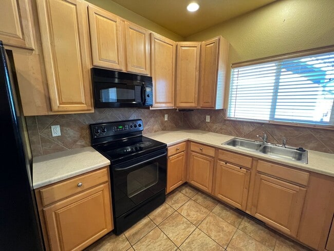 Photo - 3 bed 3.5 Bath with Bonus Studio Suite Above Detached Garage!