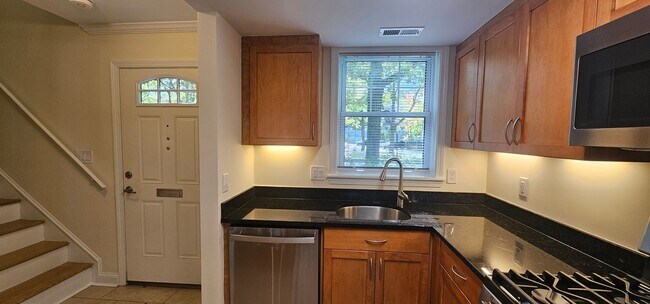 Photo - Spacious 2-bedroom townhouse on beautifully landscaped grounds.