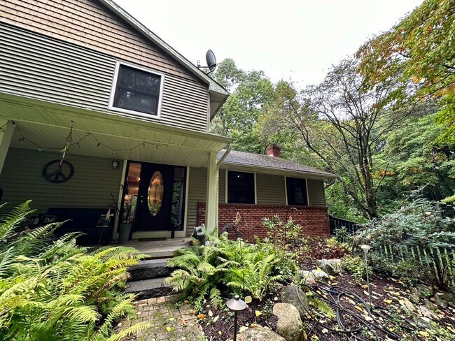 Photo - Dream Home in Highland, Michigan: Your Private Oasis on 5 Wooded Acres