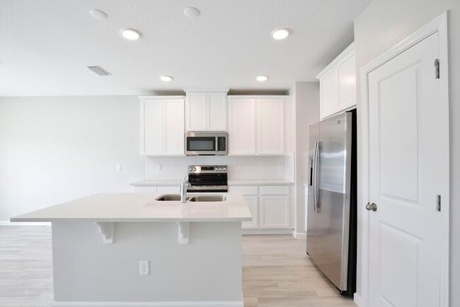 Photo - Brand-New 3/3 Modern Townhome in Gated Tys...