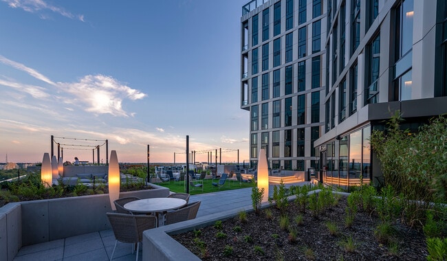 Breathtaking views and comfortable seating from your rooftop deck