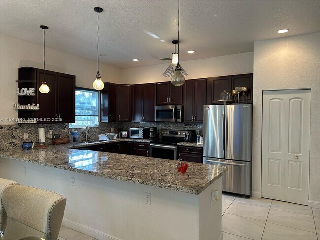 210 SW 4th St