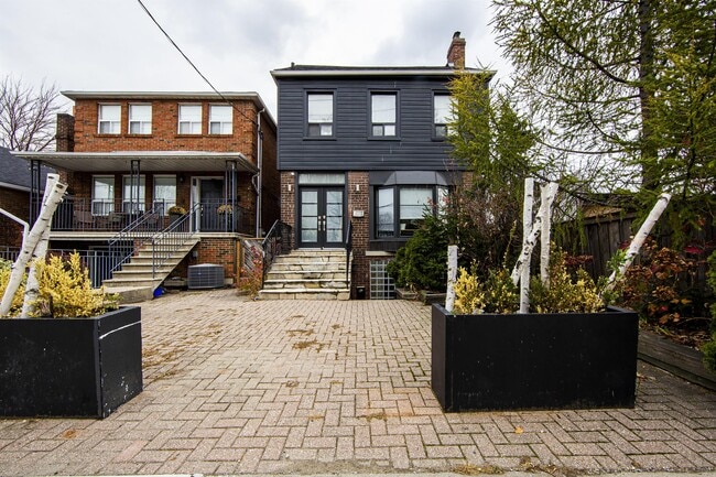 Building Photo - 1273 Pape Ave