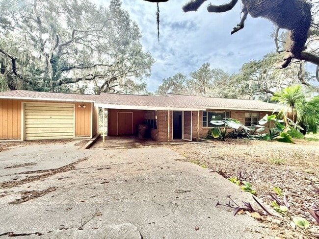 Building Photo - Enjoy the peace and quiet in this secluded home located on private lake!!!