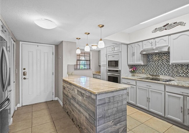 Photo - Bright Furnished End-Unit Condo Overlooking the Pond