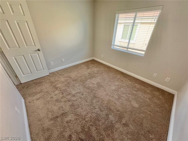 Building Photo - 10663 Petricola St Unit 102