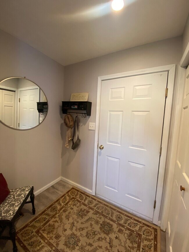 Photo - Gorgeous 3 bedroom 2.5 bath with one stall detached garage and fenced in backyard for rent!