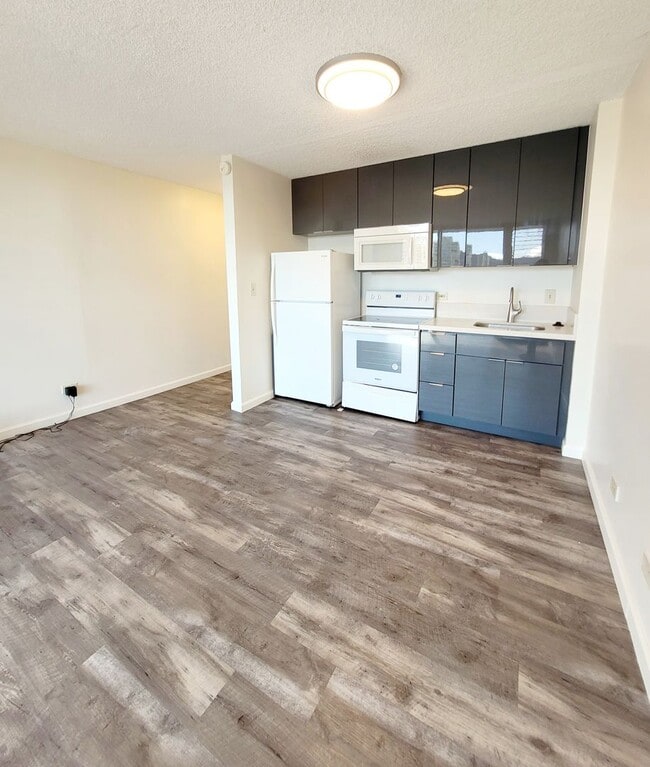 Building Photo - AVAILABLE | Updated Studio | Location: Waikiki, Fairway Villa | Includes: Assigned Parking Space,... Unit 2303