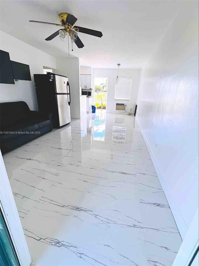 Building Photo - 7401 Pines Blvd Unit 209