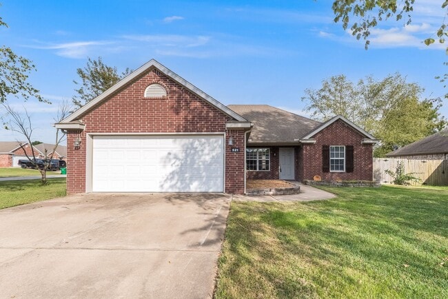 Photo - Charming 3-Bedroom Home with Backyard & Ga...