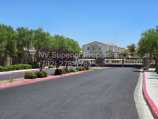 NW! 3 Bedroom Townhouse!! Gated!! Parks!! All Tile Floors Downstairs!! 2 Car Garage!!!