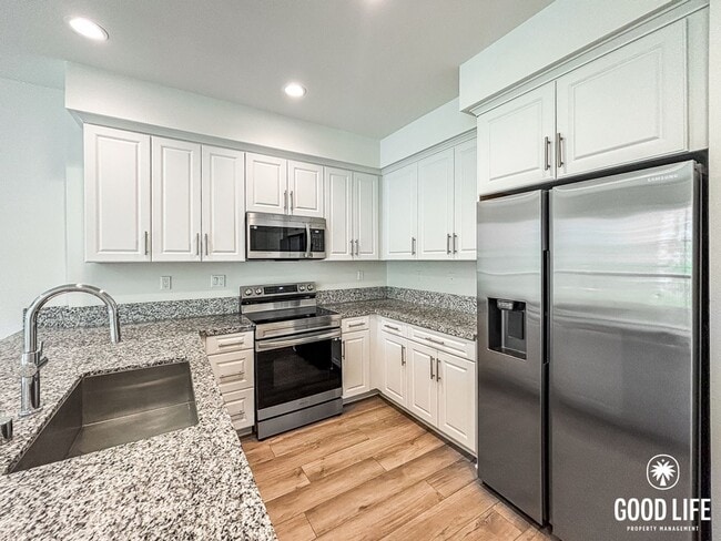 Photo - Beautiful 2BD/2.5BA Townhouse in Spring Valley W/ Central A/C, W/D, & Community Pool!