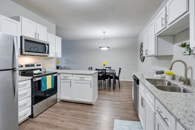 Renovated Kitchen Featuring Vinyl Wood-Style Flooring