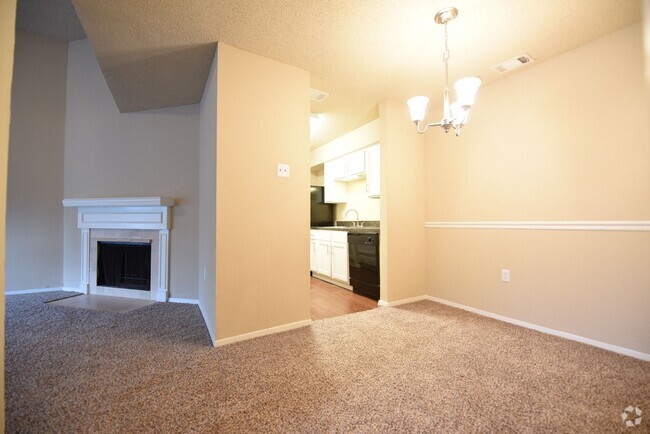 Building Photo - Second floor unit remodeled with fireplace! Rental