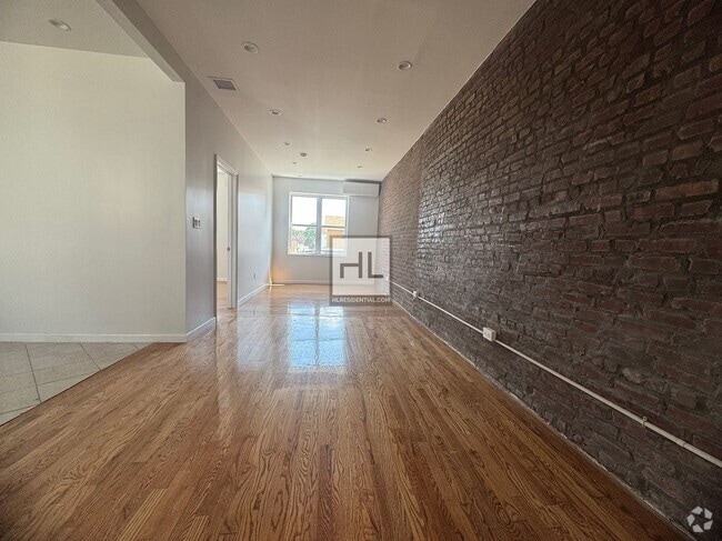 Building Photo - Fully Renovated 1-Bedroom Apartment in the... Unit 2 F