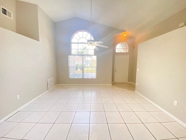 Photo - 3 Bed 2 Bath Home with Stainless Steel Appliances Near Poinciana Pkwy!