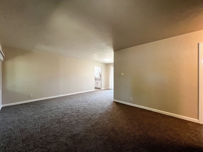 Photo - Freshly Renovated 3 Bedroom Home with Large Fenced Yard & Double Garage