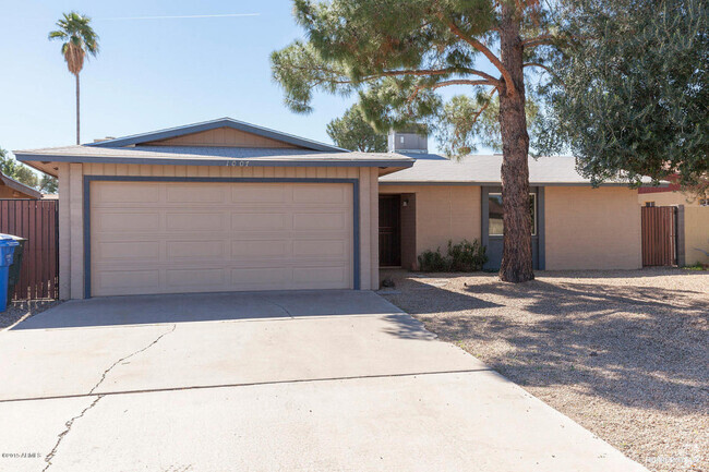 Building Photo - REMODELED 3 BEDROOM HOME W WOOD FLOORING I...