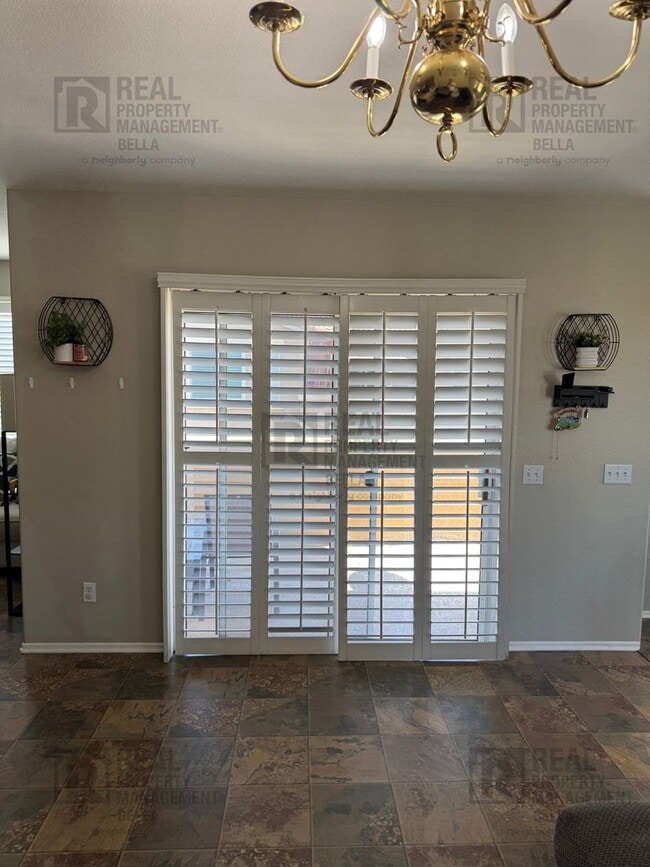 Photo - Charming End-Unit Condo with Modern Amenit...