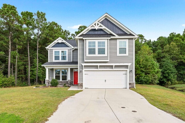 Building Photo - Spacious 4-Bedroom Retreat with 2.5 Baths ...