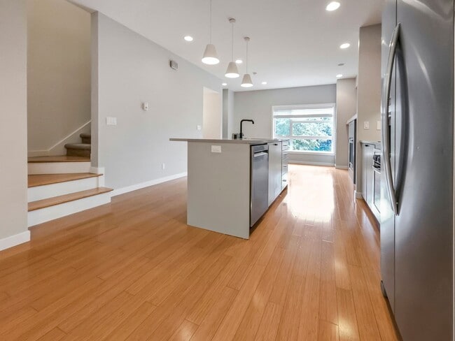 Photo - 3-Story Townhouse | 3 Bed, 3.5 Bath | Central Heating | Hardwood Floors | Carpeted Bedrooms | Off...