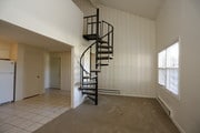 1BR,1BA - Spiral Staircase - Living Room