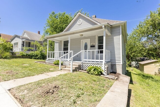 Photo - Remodeled 2-Bedroom Bungalow with Spacious Yard & 1-Car Basement Garage