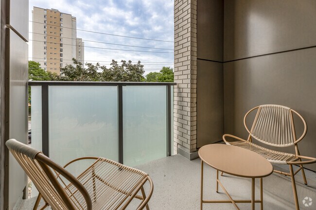 1BR + Den, 2BA - 734SF - Balcony